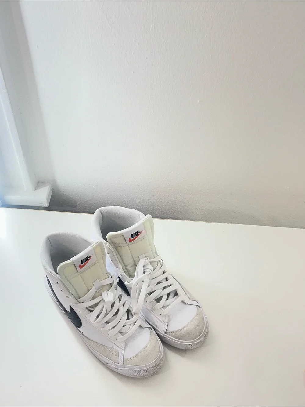 Nike Kids White High-Top Sneakers with Black Swoosh